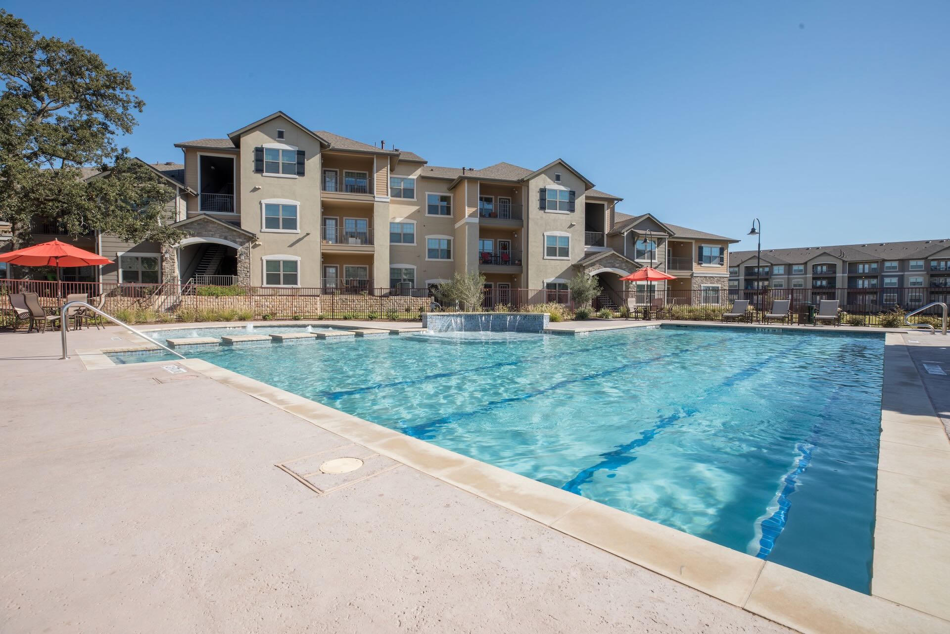 the large outdoor pool at Mariposa Apartment Homes South Broadway in Texas